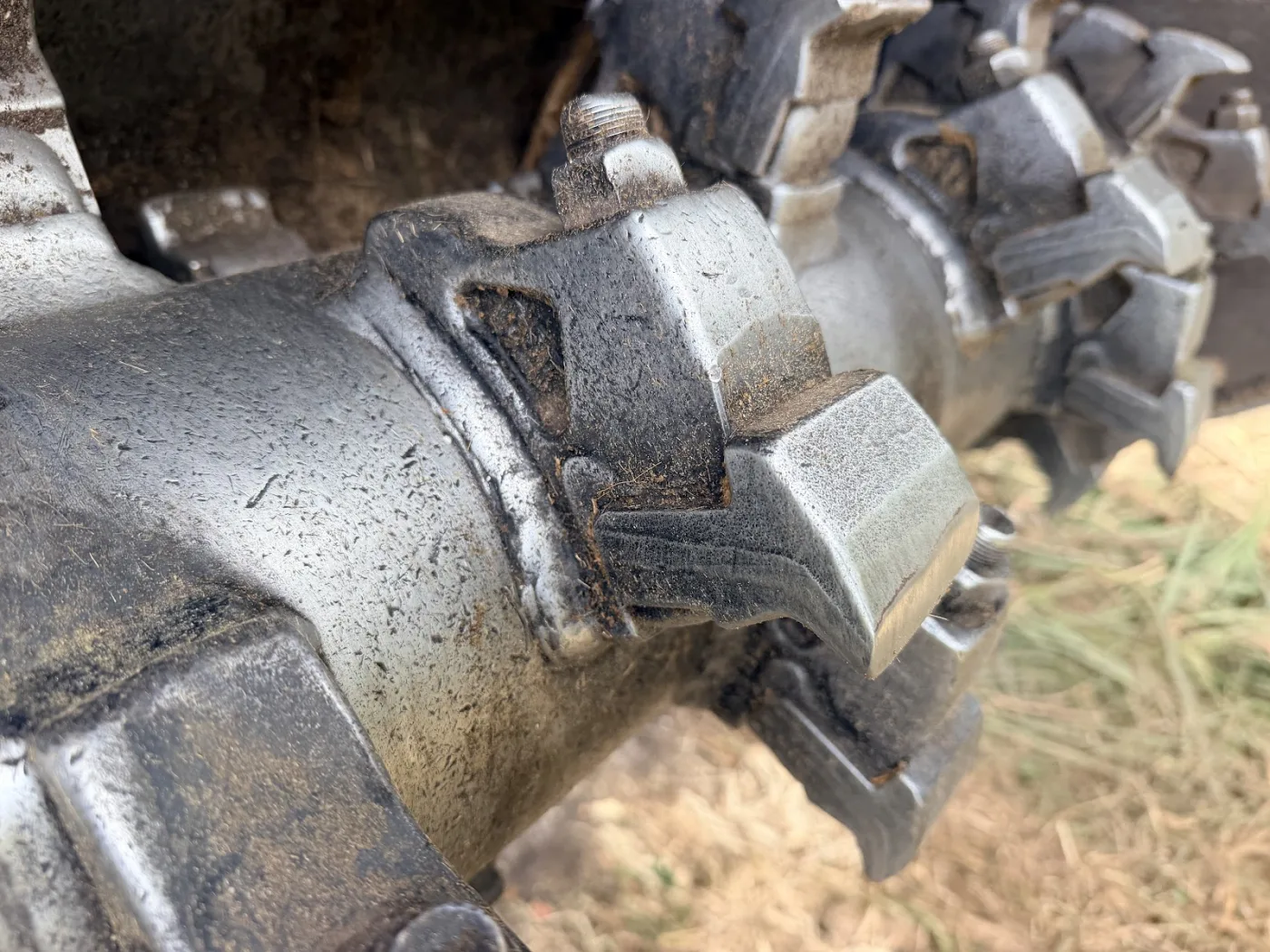 Carbide teeth on the mulching drum, up close